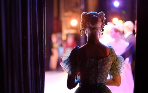 A ballerina awaiting the moment of entering the stage in the play